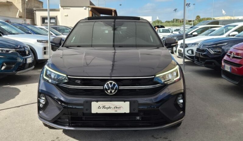 
								Volkswagen TAIGO TSI R-LINE (TETTUCCIO APRIBILE) 2024 completo									