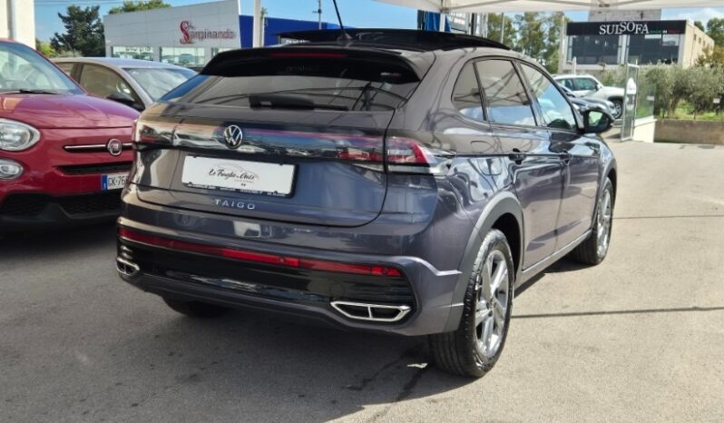 
								Volkswagen TAIGO TSI R-LINE (TETTUCCIO APRIBILE) 2024 completo									