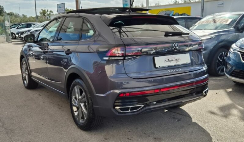 
								Volkswagen TAIGO TSI R-LINE (TETTUCCIO APRIBILE) 2024 completo									