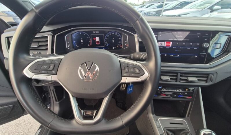 
								Volkswagen TAIGO TSI R-LINE (TETTUCCIO APRIBILE) 2024 completo									