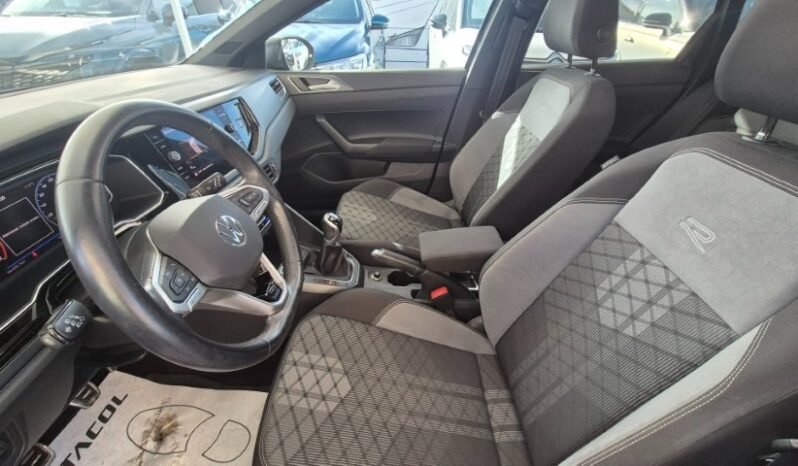 
								Volkswagen TAIGO TSI R-LINE (TETTUCCIO APRIBILE) 2022 completo									