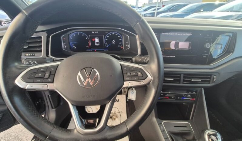 
								Volkswagen TAIGO TSI R-LINE (TETTUCCIO APRIBILE) 2022 completo									